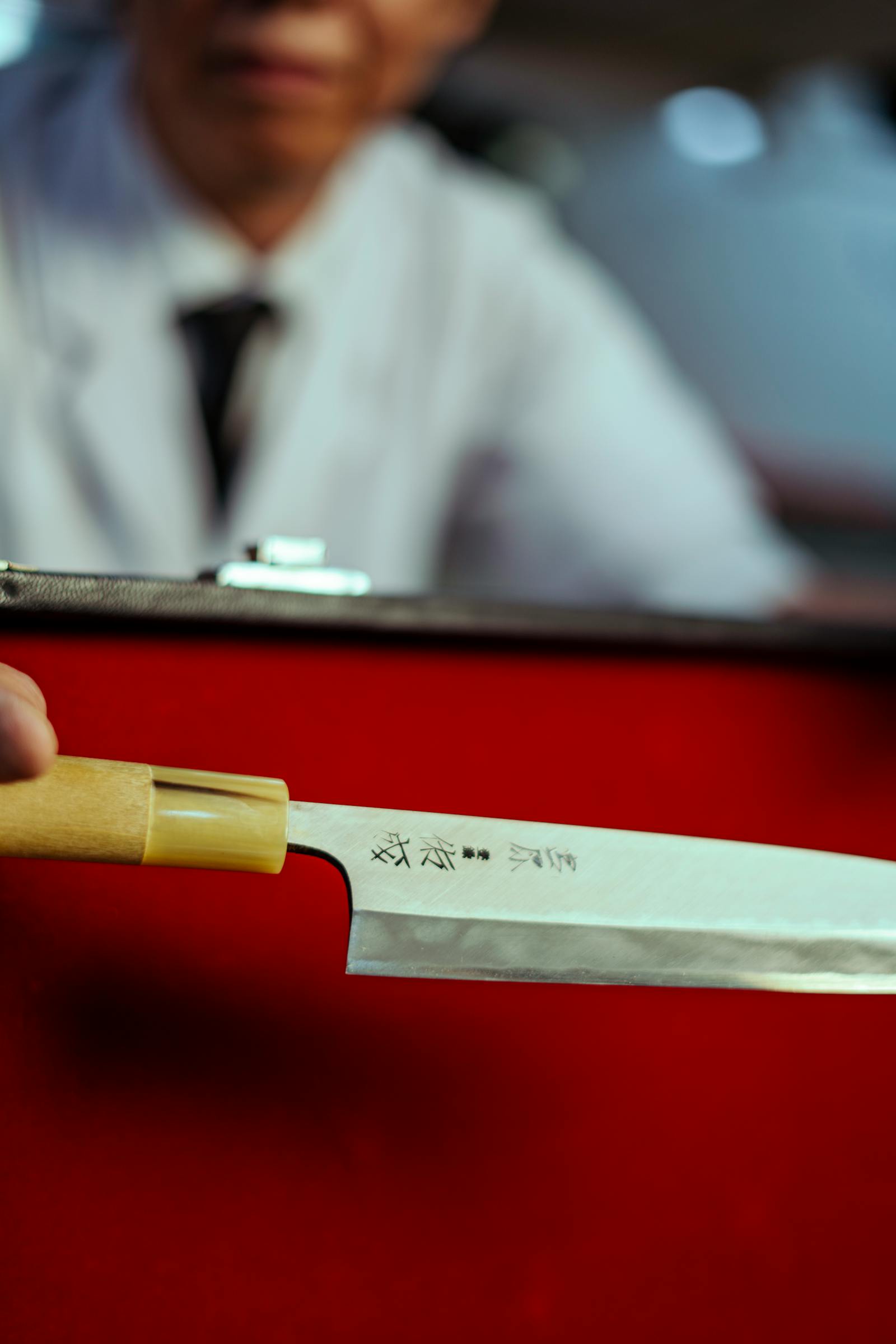 Japanese knife on cedar